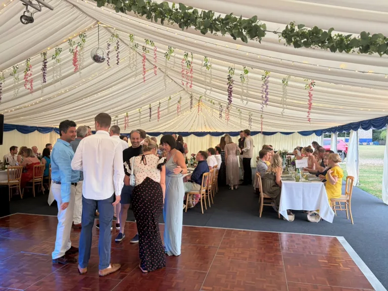 Guests inside the decorated marquee at the Barfield Summer Ball near Farnham