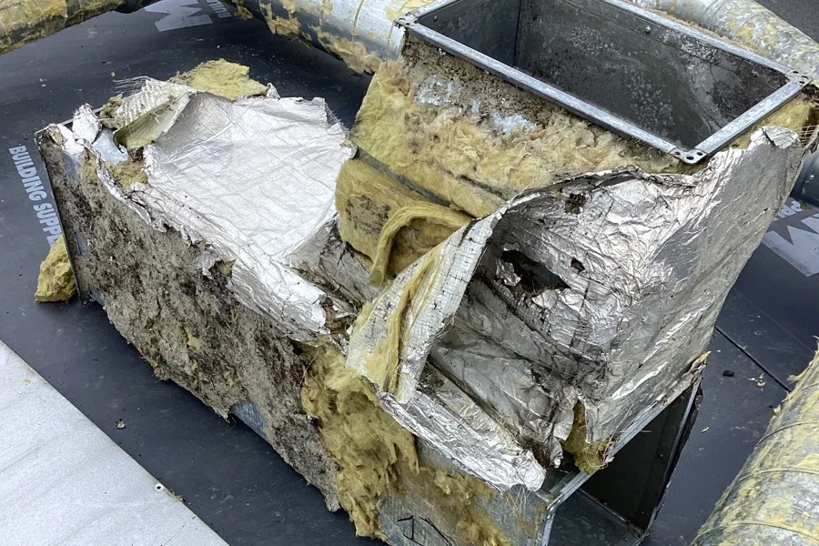 Existing rooftop ductwork and insulation before replacement at Didcot Ambulance Resource Centre