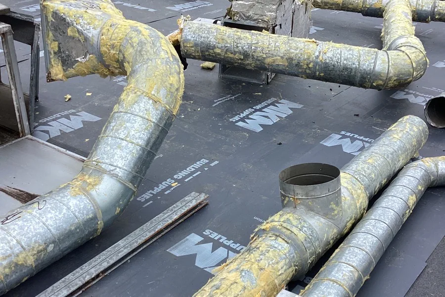 Existing rooftop ductwork removed to allow roofing works at Didcot Ambulance Resource Centre