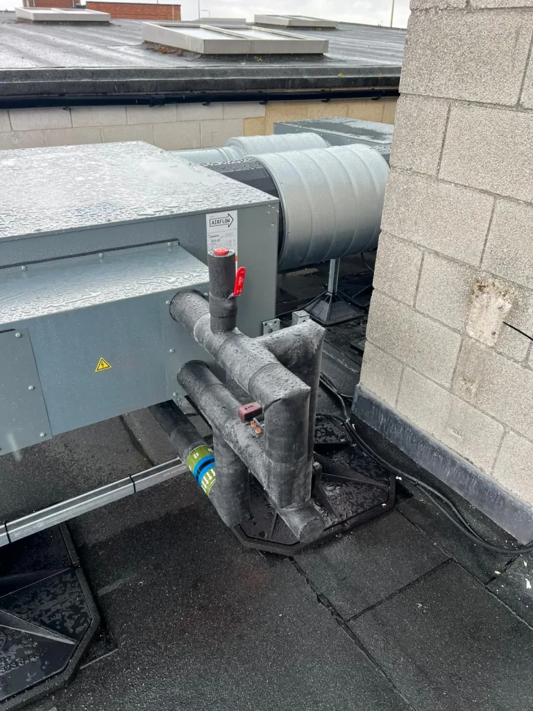 Nuaire ventilation unit with LPHW services and controls connections at Didcot Ambulance Resource Centre