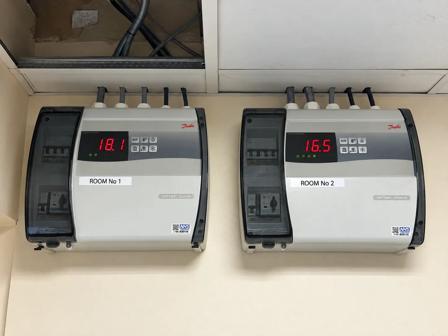 Existing wall-mounted controls for Cold Rooms 1 and 2 before electrical isolation.