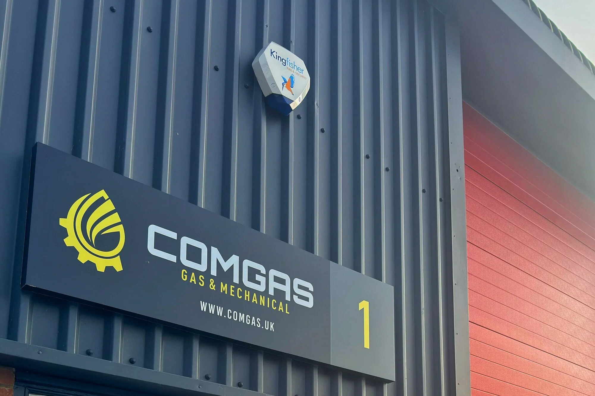 ComGas Gas & Mechanical sign above the entrance to Unit 1, Riverside Park Estate, Dogflud Way, Farnham